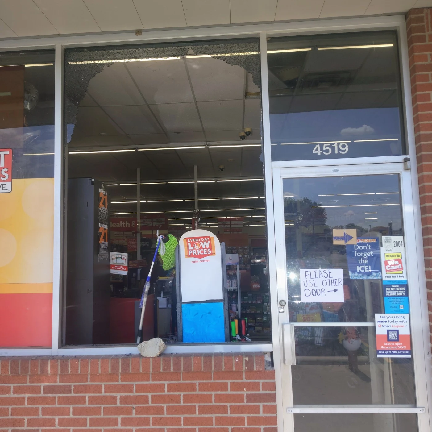 Family Dollar storefront window before temporary boarding in Cockrell Hill