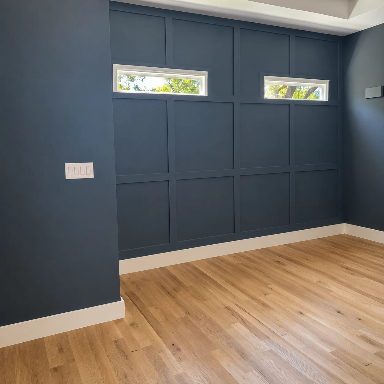 Painted paneled wall and living area in downtown Dallas