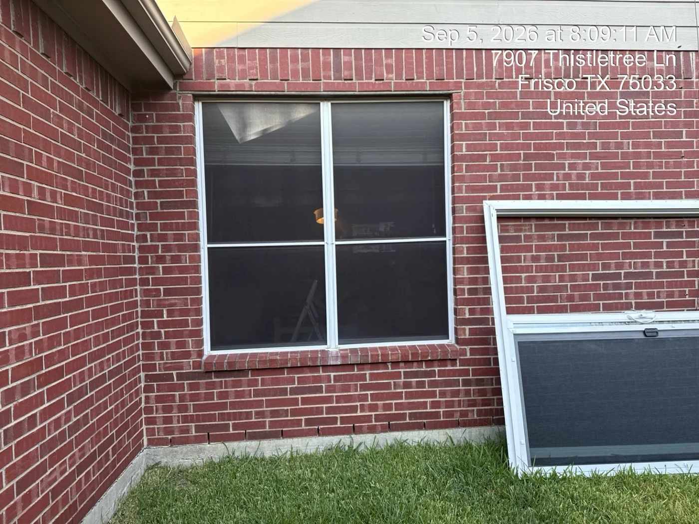Original window opening before conversion to a sliding door in Frisco