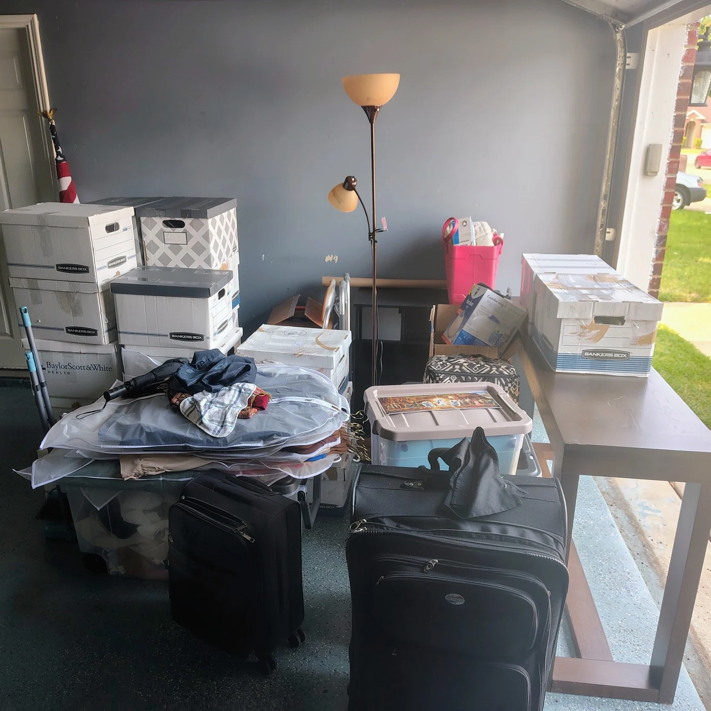Belongings ready for the move from Garland to apartment storage in Oak Cliff