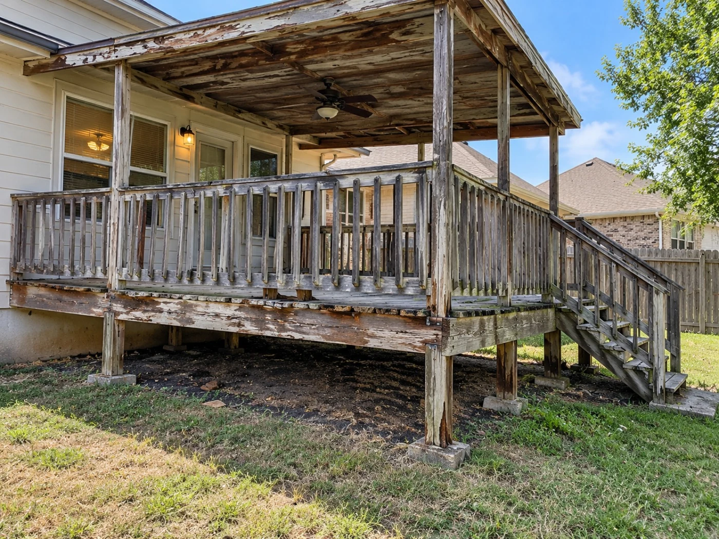 Weathered porch and railings before renovation in Grapevine