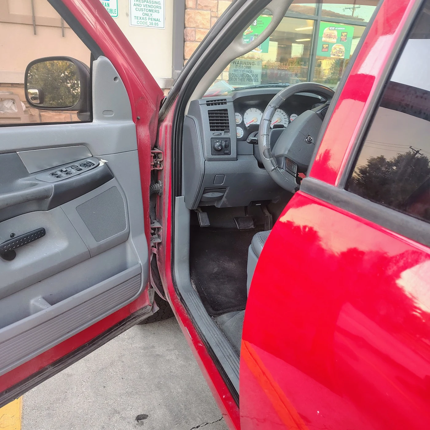 Open Dodge Ram door after successful unlocking and key retrieval