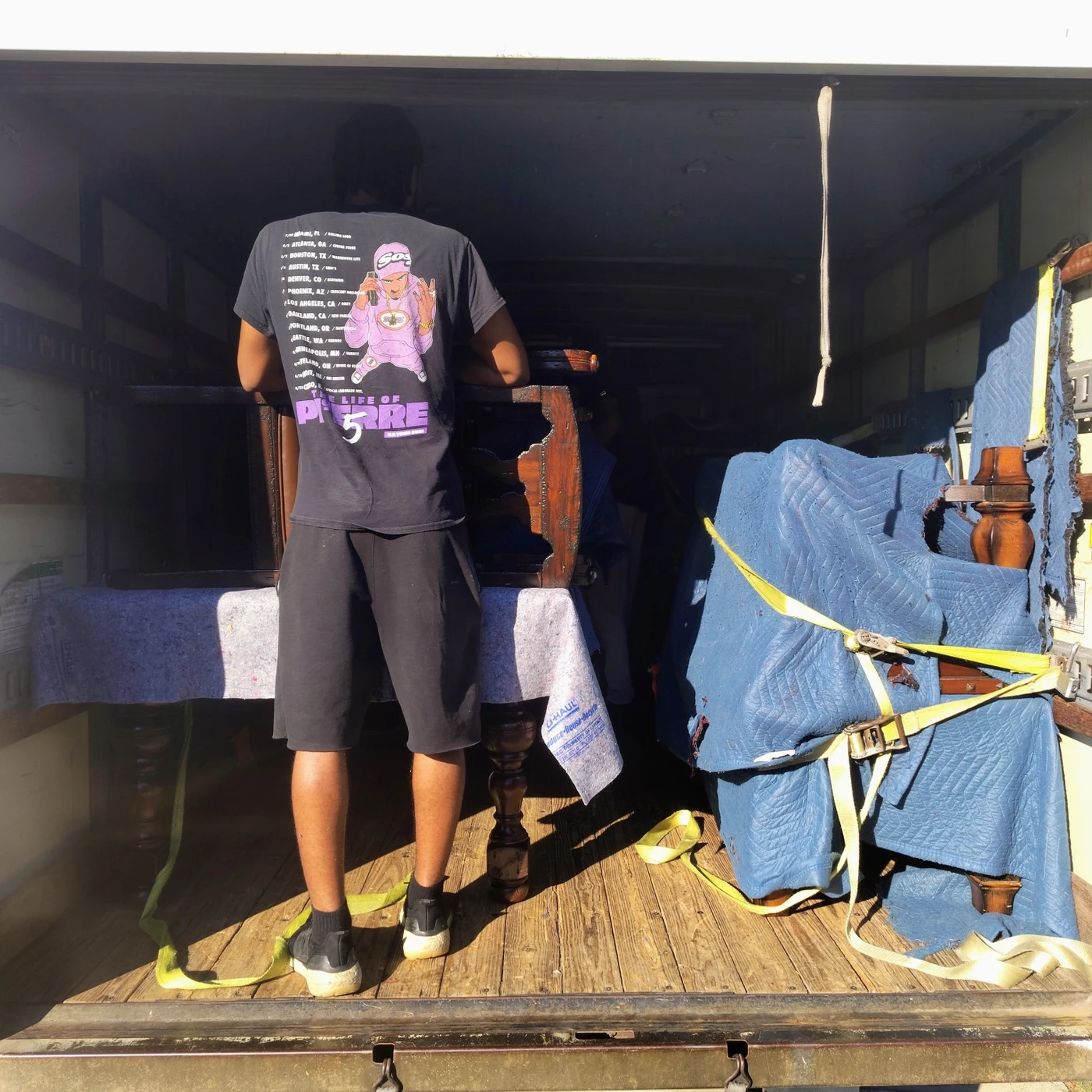 BlueStar unloading furniture from a trailer in Irving