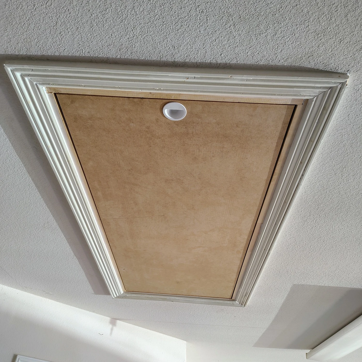 New attic door with finished trim and frame in Waxahachie
